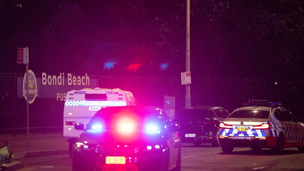 This shows the TV news reporting a mass shooting at Bondi Beach in Sydney, Australia, December 14, 2025. /Xinhua