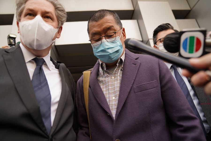 Jimmy Lai (R, front), instigator of the Hong Kong riots, leaves a police station after being granted bail in south China's Hong Kong, February 28, 2020. /Xinhua