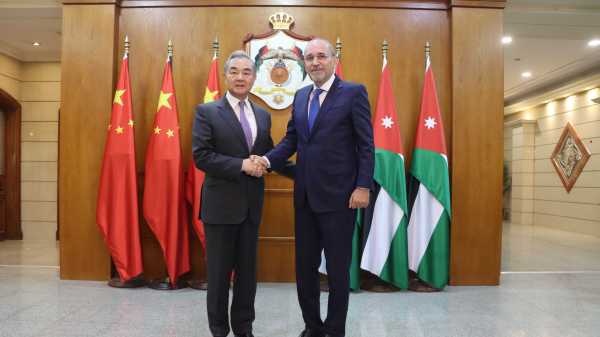 Chinese Foreign Minister Wang Yi, also a member of the Political Bureau of the Communist Party of China Central Committee, meets with Jordanian Deputy Prime Minister and Foreign Minister Ayman Safadi in Amman, December 15, 2025. /Chinese Foreign Ministry