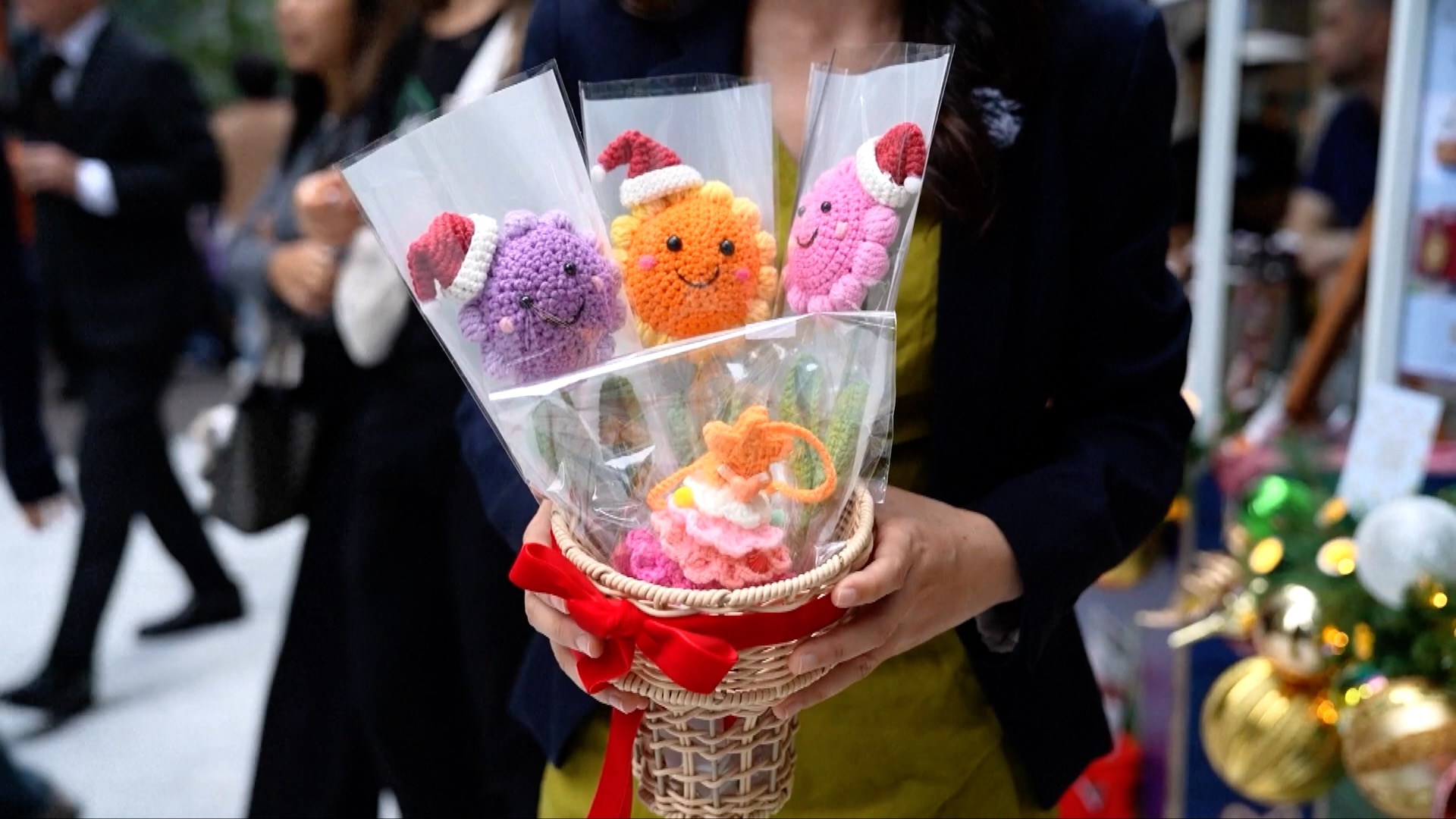 Holiday fair in Hong Kong raises funds for victims of deadly fire