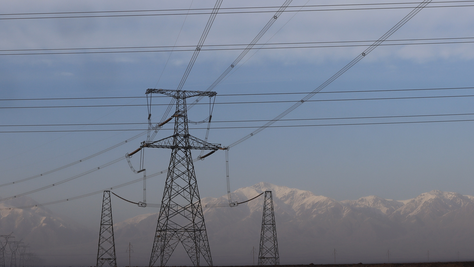 A ±800 kV High Voltage Direct Current (HVDC) Transmission line from Xinjiang to Chongqing, China, December 16, 2025. /VCG