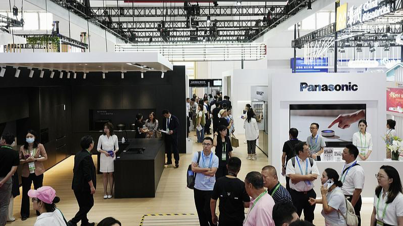 Visitors gather at Japanese electronics maker Panasonic's booth at the China International Supply Chain Expo, Beijing, China, July 16, 2025. /VCG