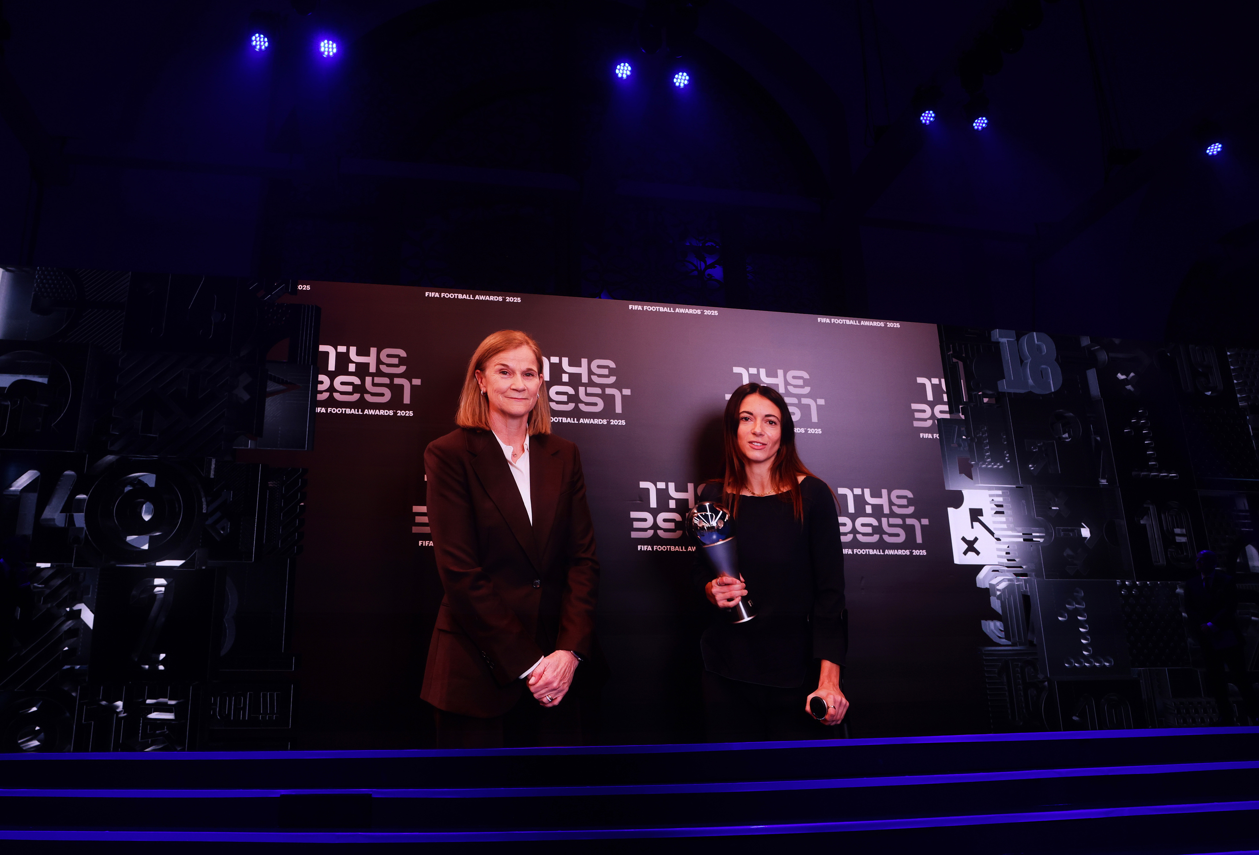 The Best Fifa Women's Player winner, Aitana Bonmati speaks on the big screen during The Best FIFA Football Awards 2025 at the Fairmont Katara Hall in Doha, Qatar, December 16, 2025. /VCG 