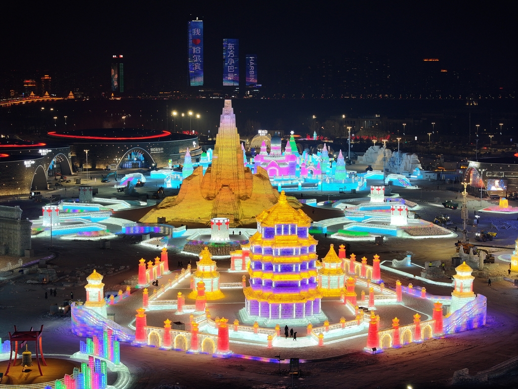 Ice sculptures light up Harbin Ice and Snow World in Harbin, Heilongjiang Province, northeast China, on December 15. /IC