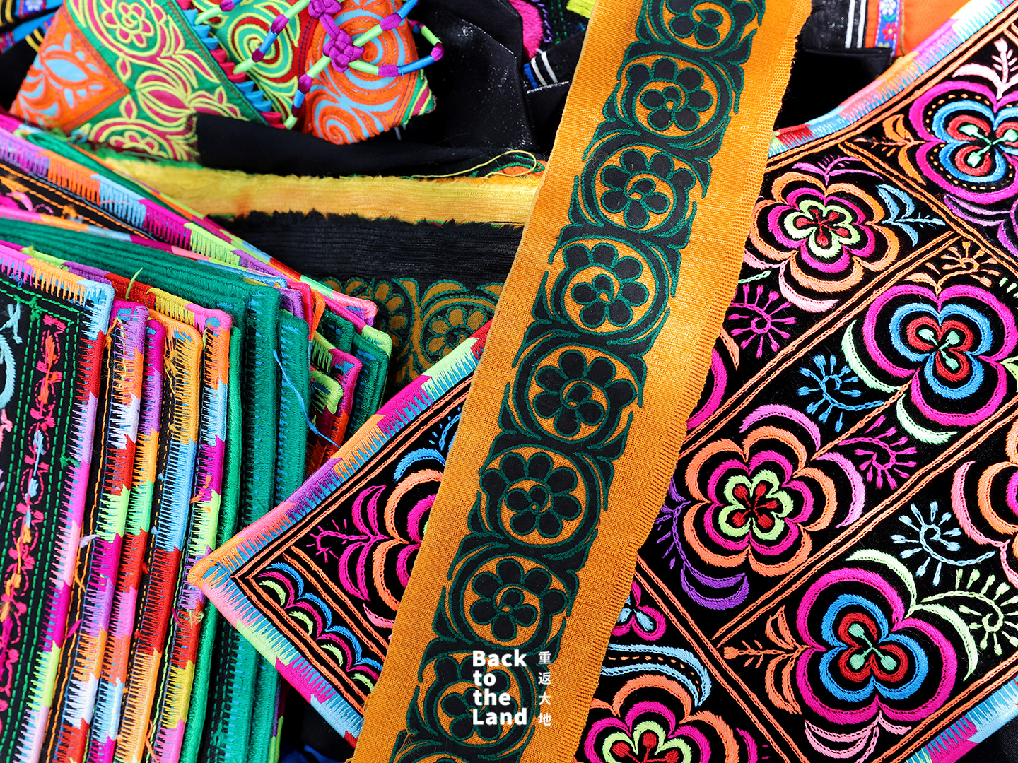 Yi embroidery features nature-inspired patterns rendered in bright, traditional colours. /CGTN