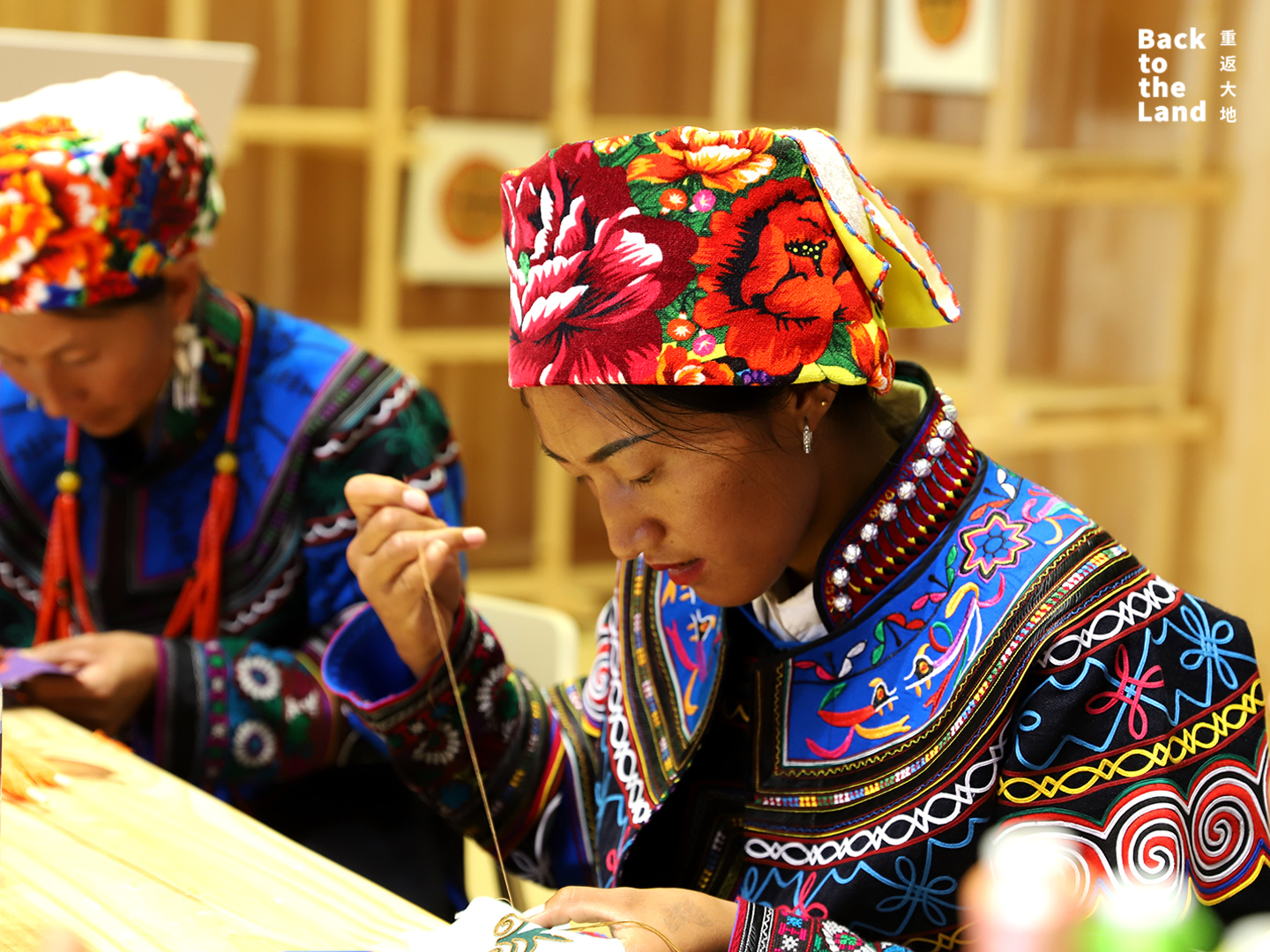 Yi embroidery features nature-inspired patterns rendered in bright, traditional colours. /CGTN