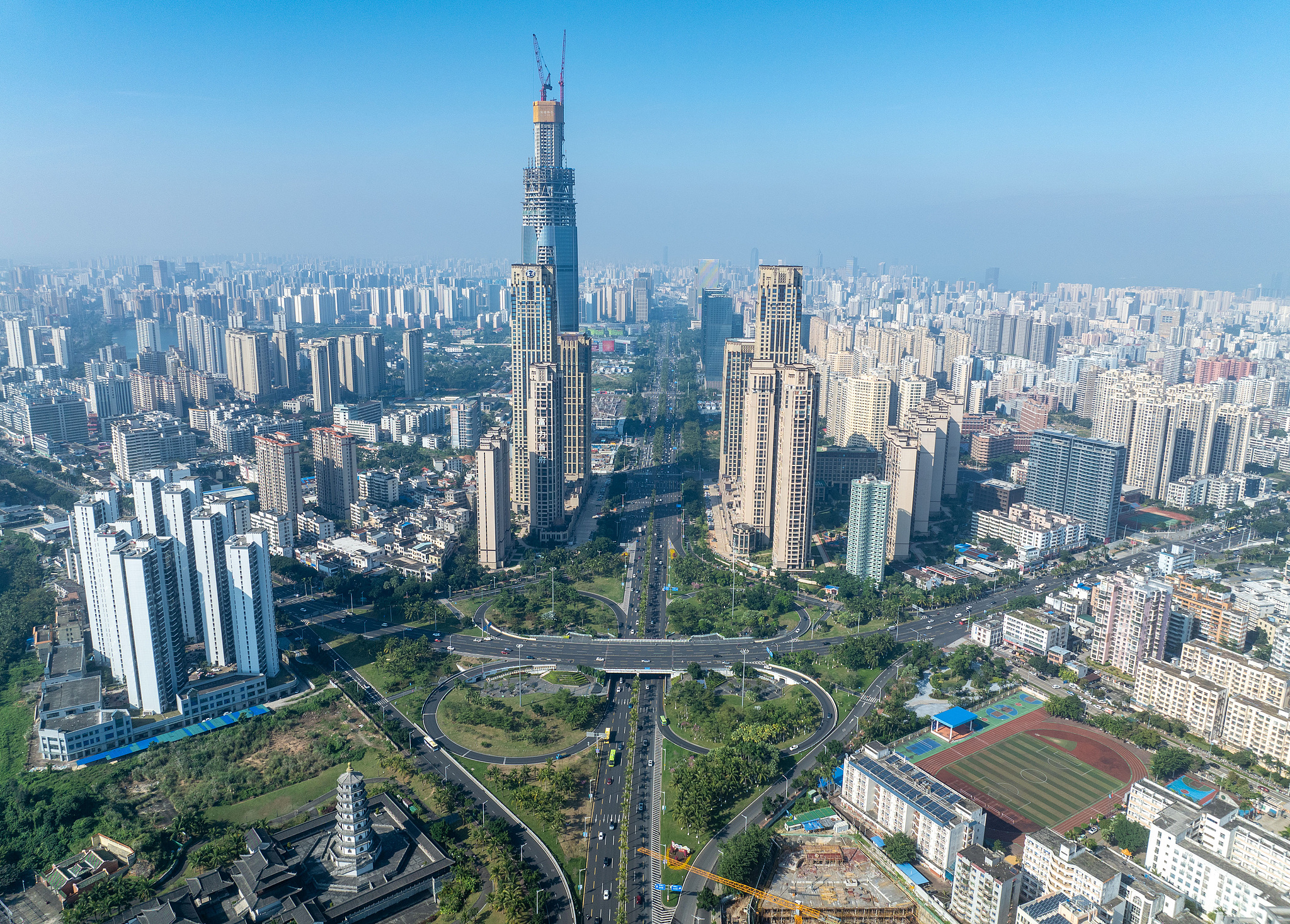 The Hainan Free Trade Port officially launched the special custom operations. The picture shows the Haifu Interchange and the surrounding buildings in Haikou City, Hainan Province on On Dec 18, 2025. /VCG 