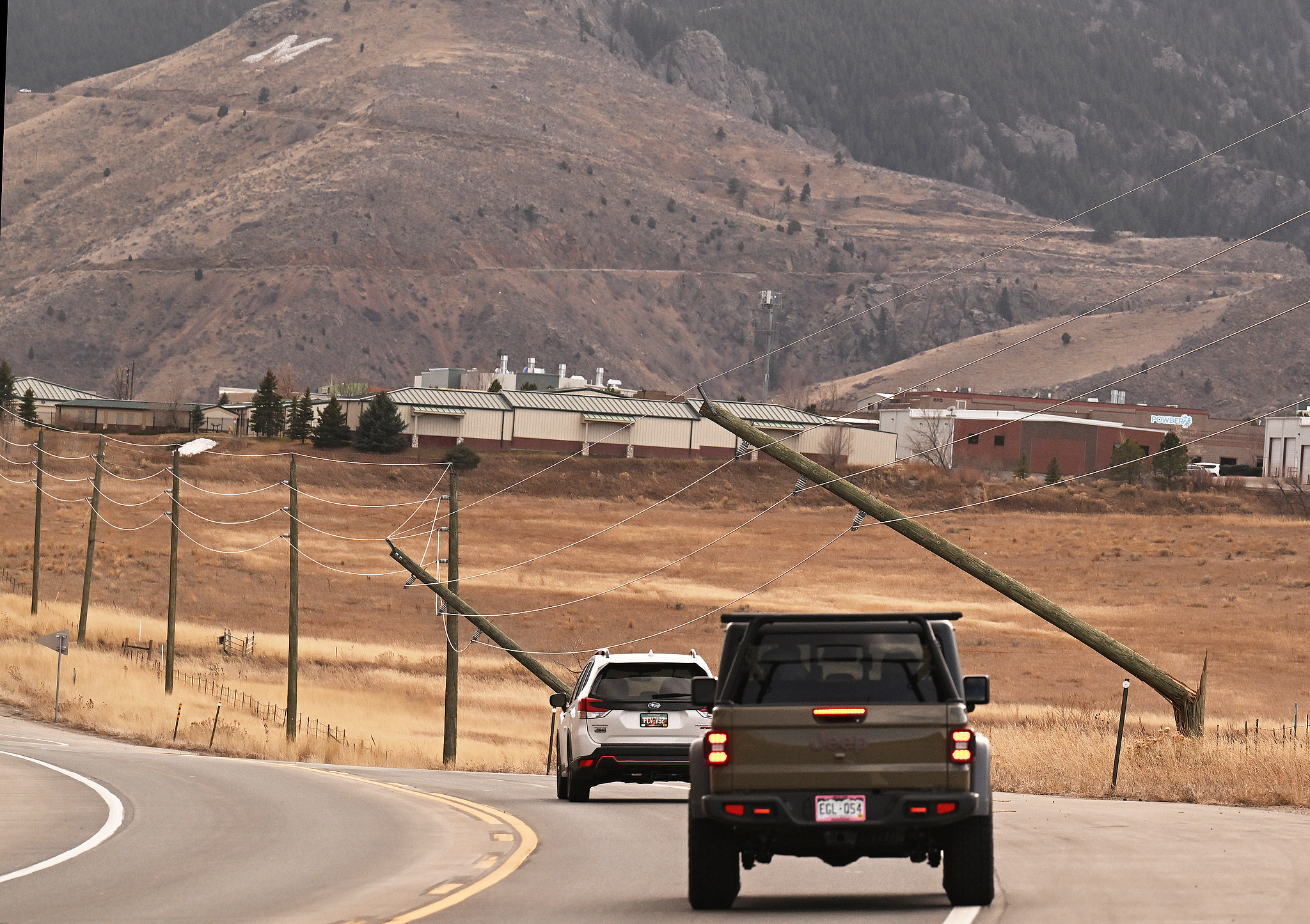 Power poles snapped in half during a strong windstorm near Golden, Colorado, U.S., December 17, 2025. /VCG