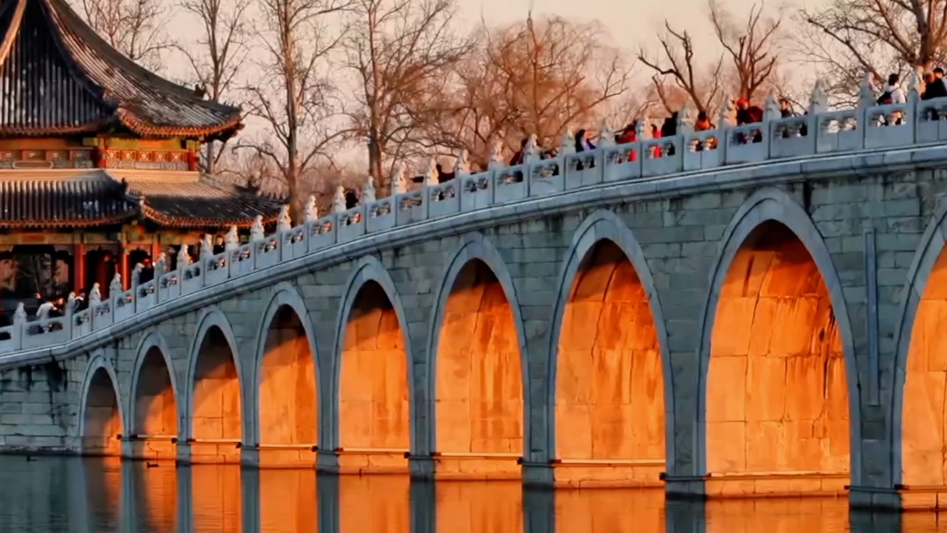 Sunset magic at Beijing's Seventeen-Arch Bridge around winter solstice