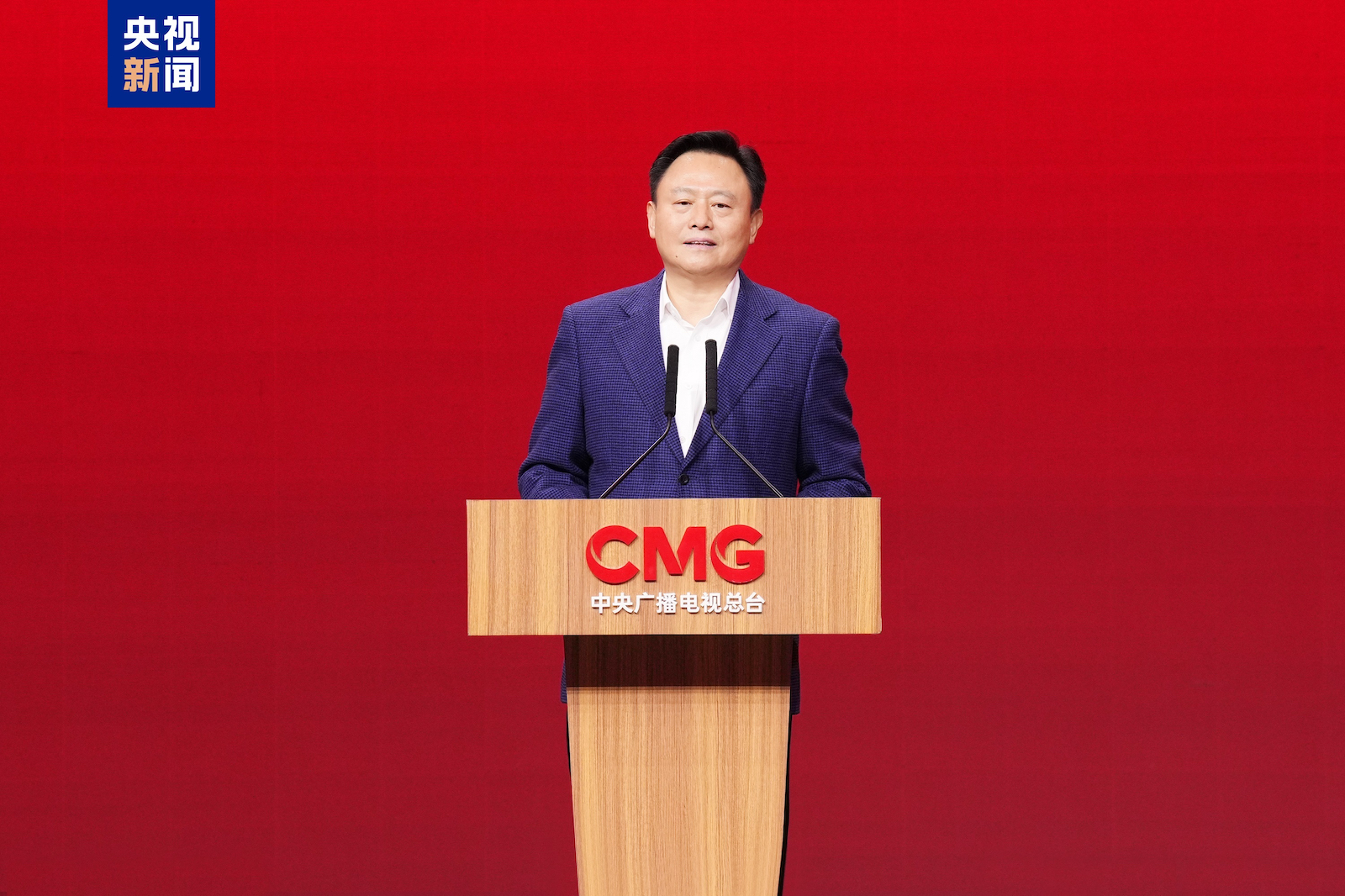Xu Liuping, secretary of the leading party members group, vice chairman and first secretary of the secretariat of the ACFTU, addresses at the signing ceremony in Beijing, China, December 22, 2025. /CMG