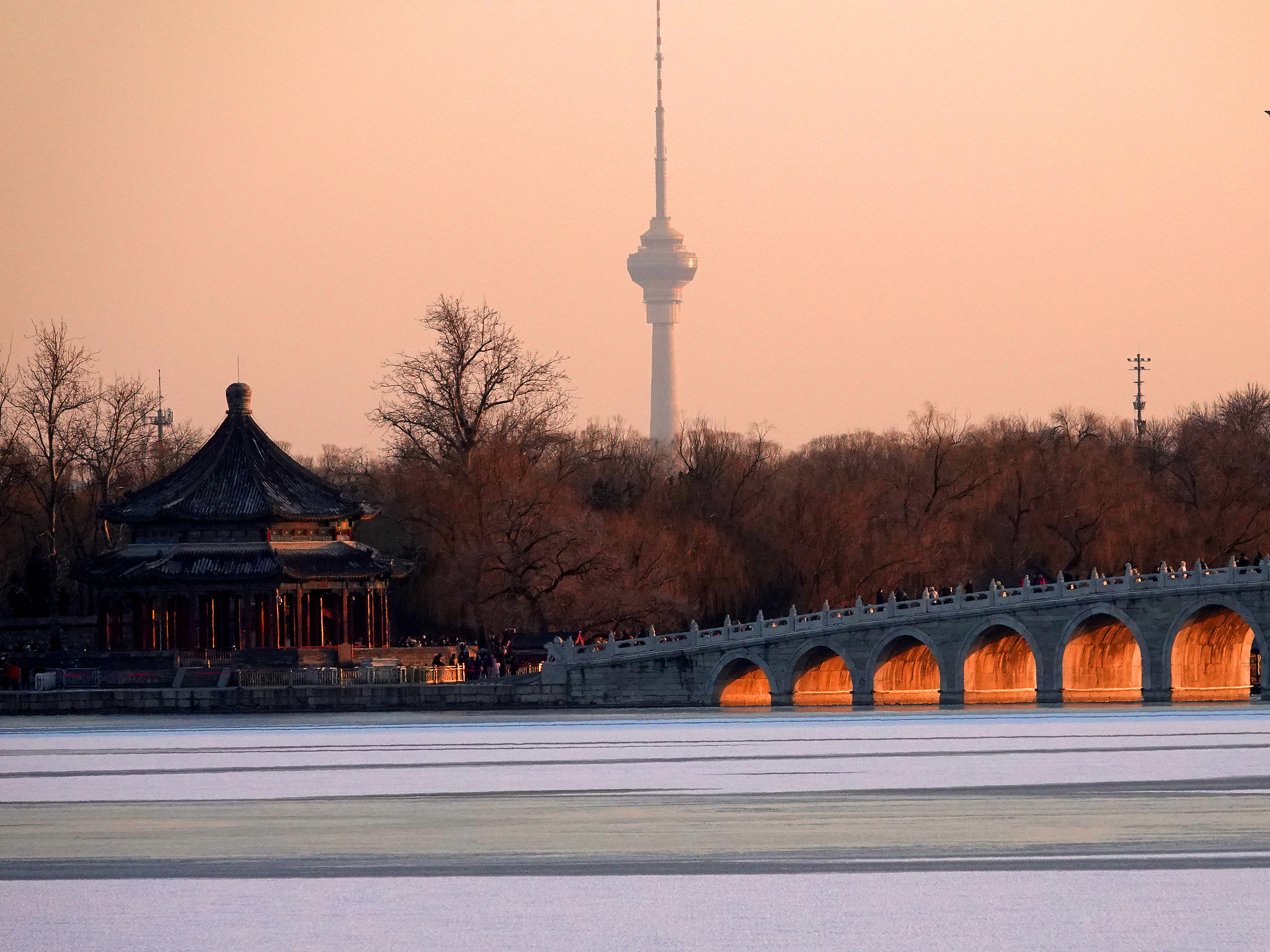 Beijing's iconic Summer Palace bridge glows on winter solstice