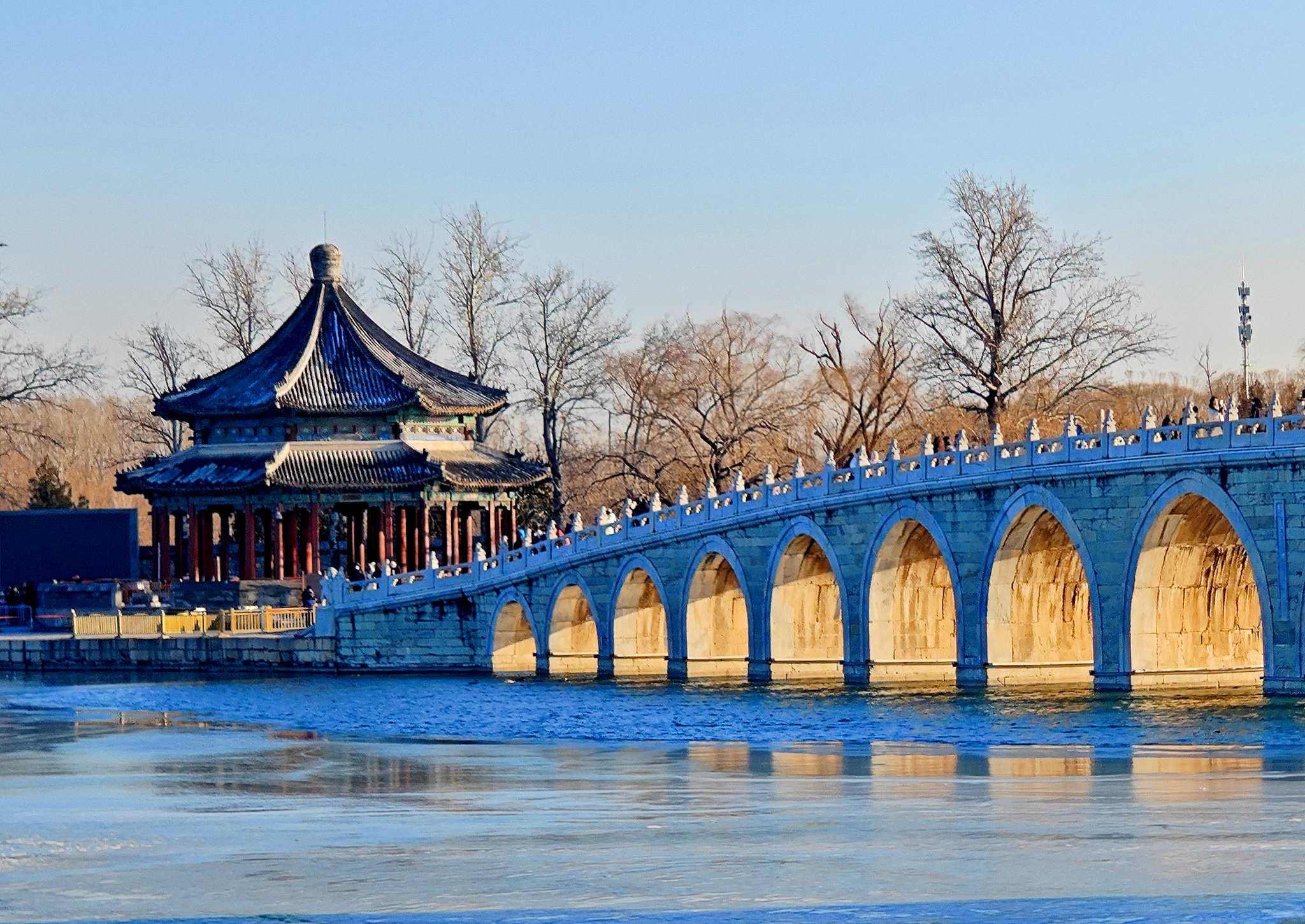 Beijing's iconic Summer Palace bridge glows on winter solstice