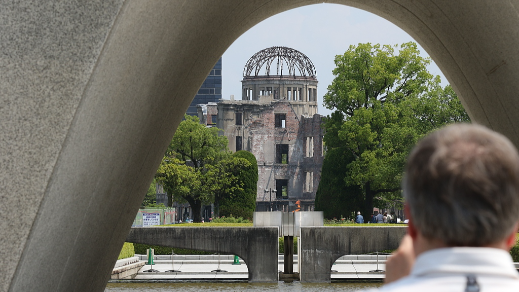 A visitor taking a photo of the Hiroshima Peace Memorial Park, Hiroshima, Japan, July 13, 2025. /VCG