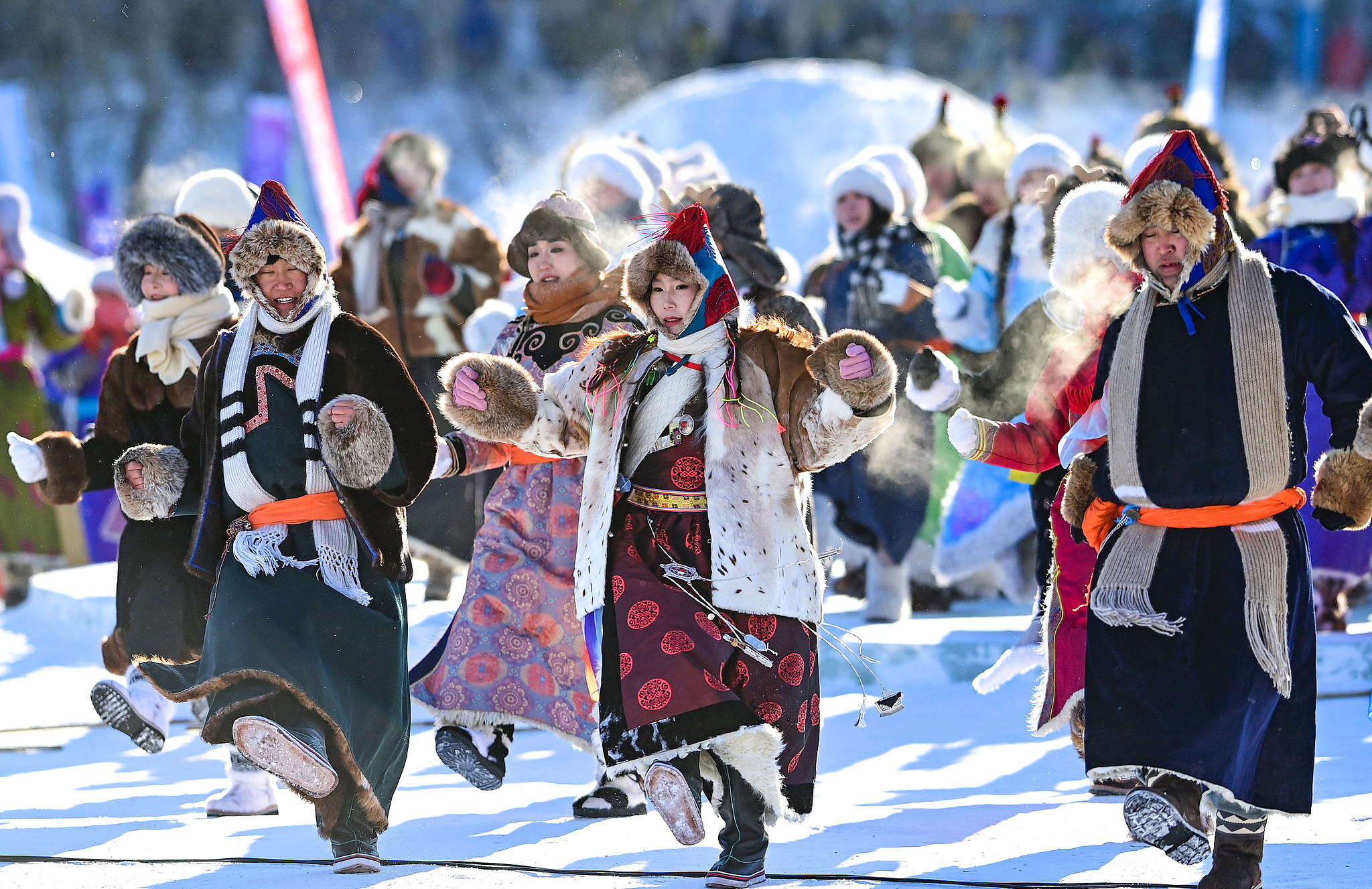 Actors perform during the opening ceremony of the 21st Ice and Snow Naadam Fair of the Inner Mongolia Autonomous Region, in Hailar District of Hulun Buir, north China. /VCG