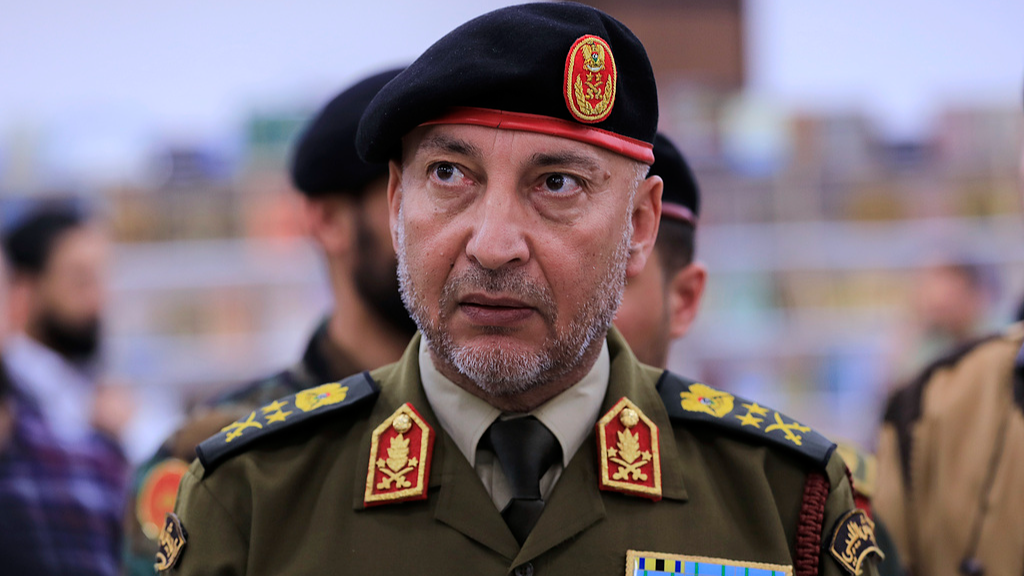 Libya's army chief of staff, Mohammed Al-Haddad, speaks during the opening of a book fair in Tripoli, Libya, April 21, 2025. /VCG