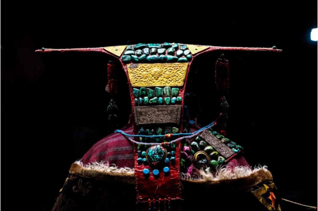 A detail of the gems used in traditional Pulan dress, Xizang Autonomous Region. /CGTN