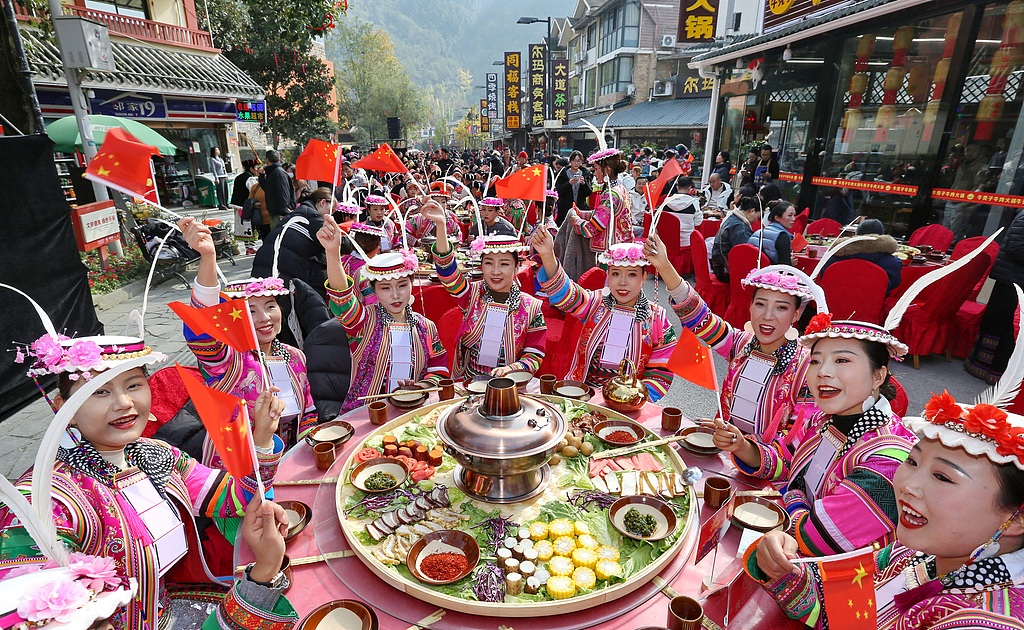 Residents attend a group banquet in celebration of the Qiang New Year in Wenchuan County, Aba Tibetan and Qiang Autonomous Prefecture, southwest China's Sichuan Province, November 20, 2025. /VCG