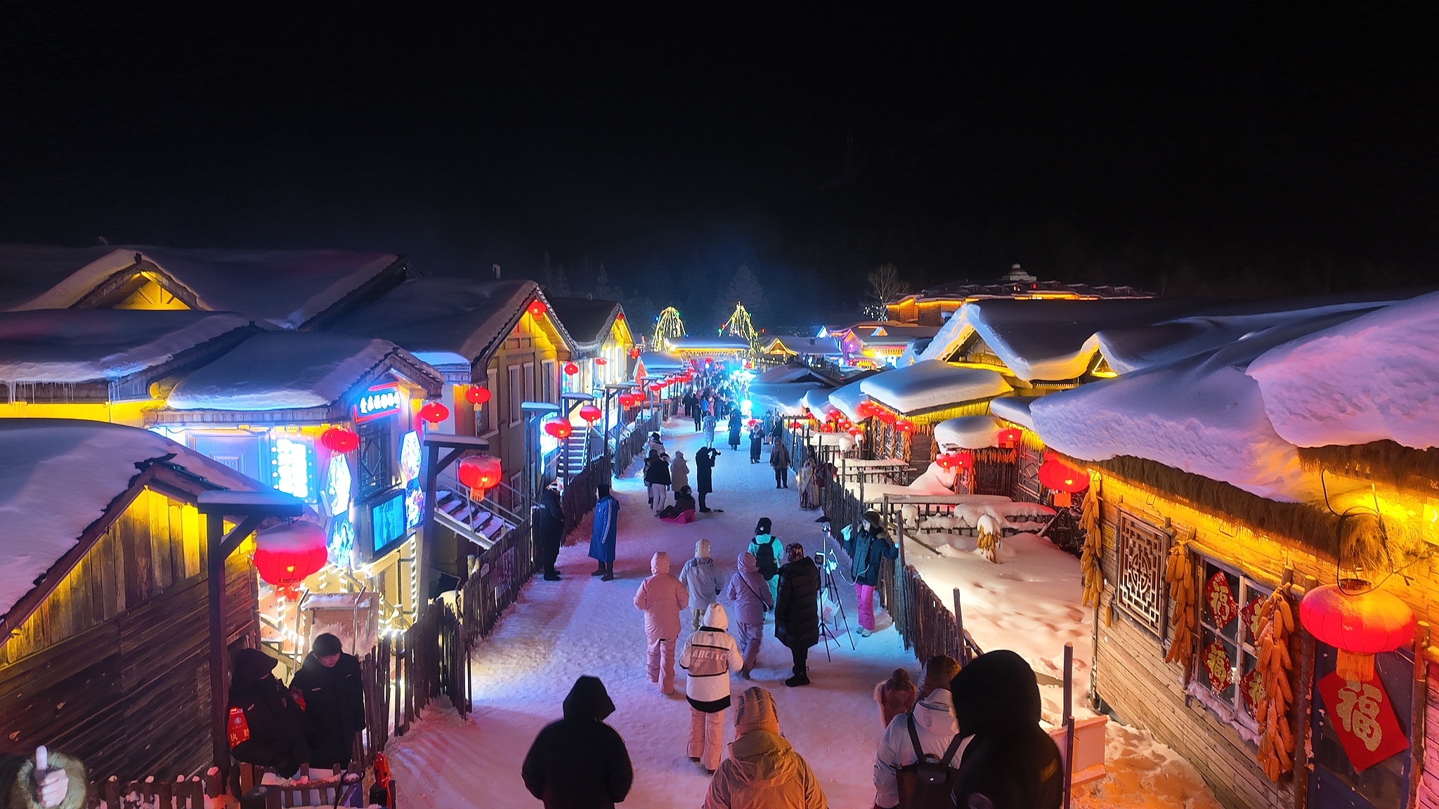 A night view of the Snow Town scenic area in Mudanjiang, Heilongjiang Province, on December 24, 2025. /VCG