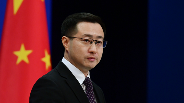 China criticizes Japan's record defense budget plan