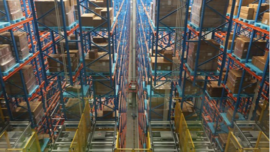 A stacker crane (C) places goods at an automated high-bay warehouse of the Maersk Lin-gang Flagship Logistics Center in east China's Shanghai, on November 26, 2025. /Xinhua