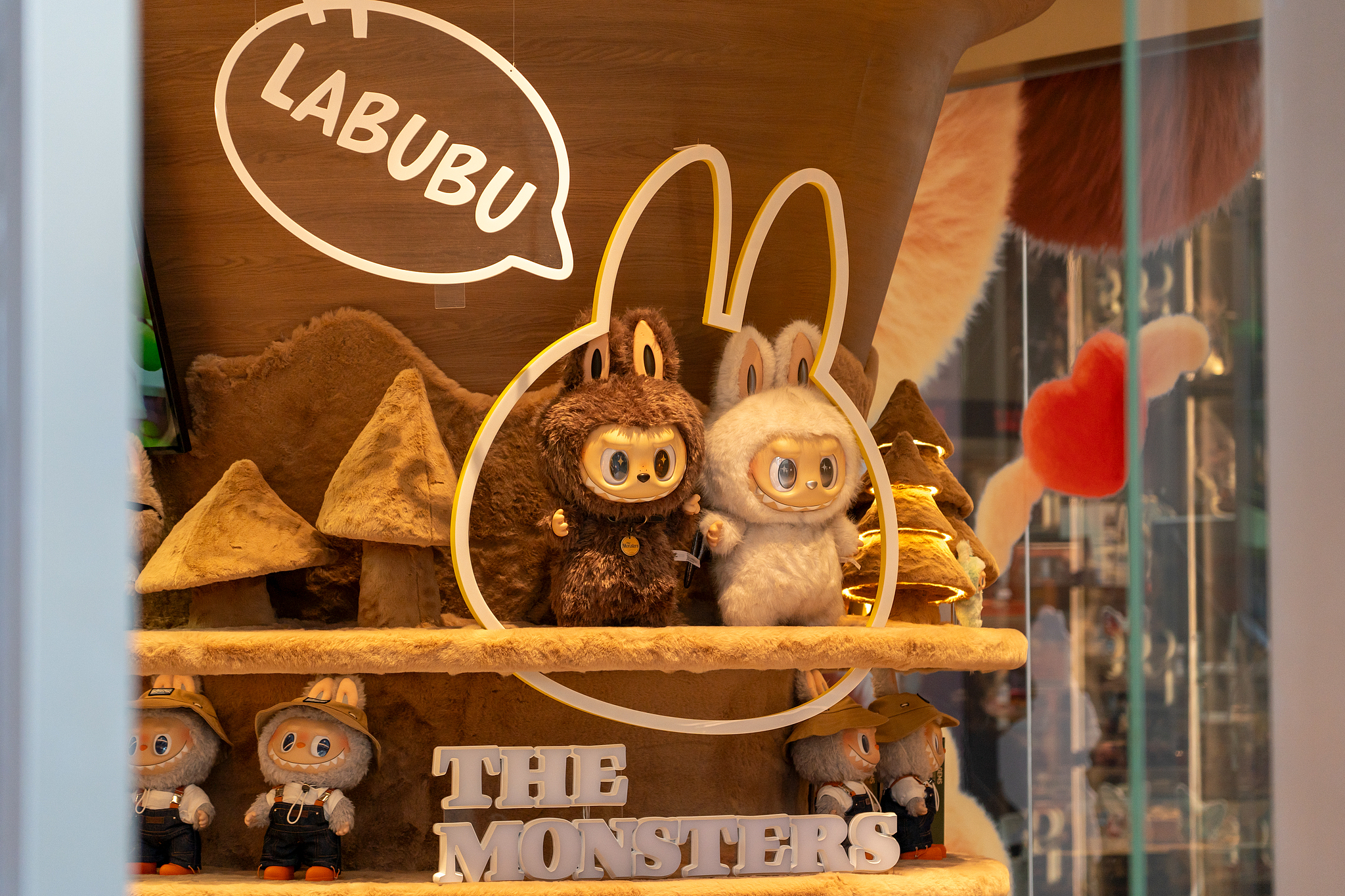 Labubu vinyl plush toys on display at a PopMart store in Shenzhen, Guangdong Province, China, December 16, 2025. /VCG