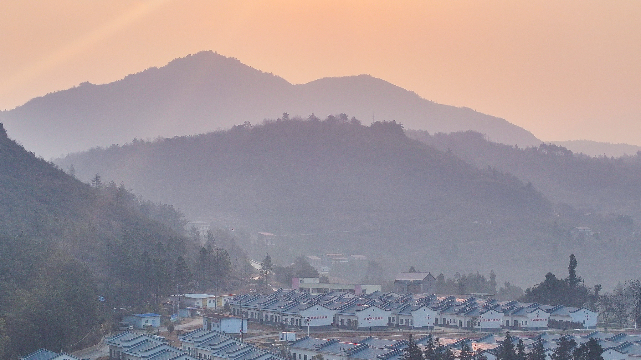 A view of the Langshi resettlement village in Daoxian County, Hunan Province. By developing industries, guiding employment, and providing incentives and subsidies, the county has lifted its residents from poverty. January 15, 2025. /VCG