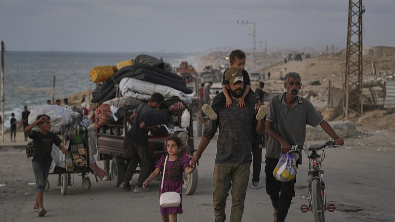 Displaced Palestinians flee northern Gaza along the coastal road toward the south, as Israel announced an expanded operation in Gaza City, September 16, 2025. /CFP