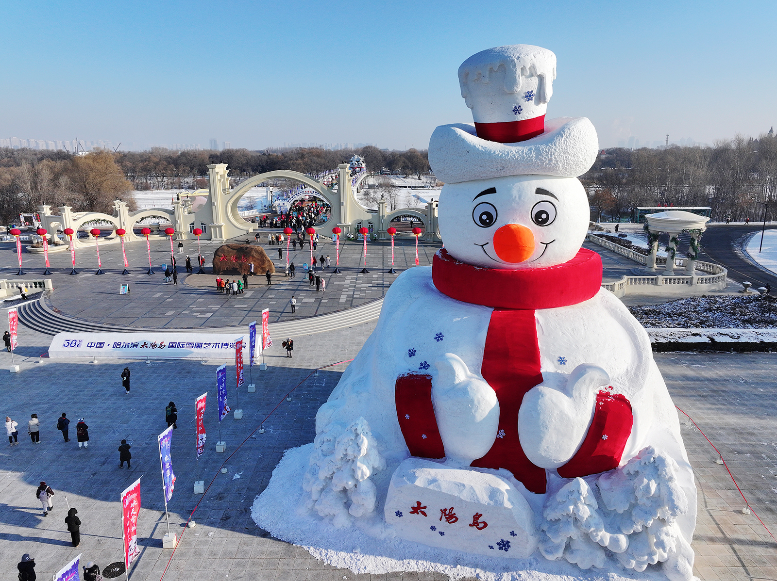 A giant snowman is seen at the 38th Sun Island International Snow Sculpture Art Expo in Harbin, Heilongjiang Province during a trial run on December 27, 2025. /VCG