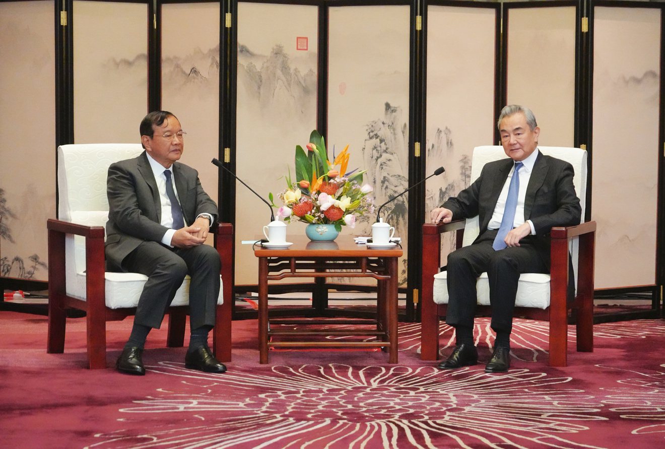 Chinese Foreign Minister Wang Yi (R), also a member of the Political Bureau of the Communist Party of China Central Committee, holds talks with Prak Sokhonn, Cambodian deputy prime minister and minister of foreign affairs and international cooperation in Yuxi City, southwest China's Yunnan Province, December 28, 2025. /CGTN
