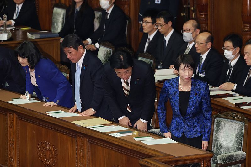 Japanese Prime Minister Sanae Takaichi (front row R) and other cabinet members bow after the passage of the fiscal 2025 extra budget bill at the House of Representatives plenary session at the National Diet in Tokyo, December 11, 2025. /Xinhua