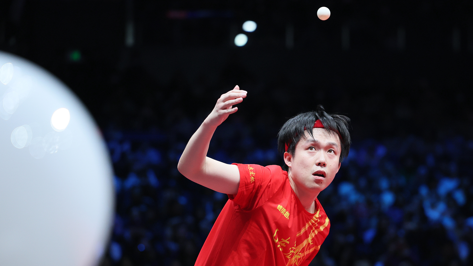 Wang Chuqin of Shandong Weiqiao serves against Xiang Peng of Huangshi Huaxin in a men's singles match during the Chinese Table Tennis Super League Finals on December 28, 2025 in Nanjing, China. /VCG
