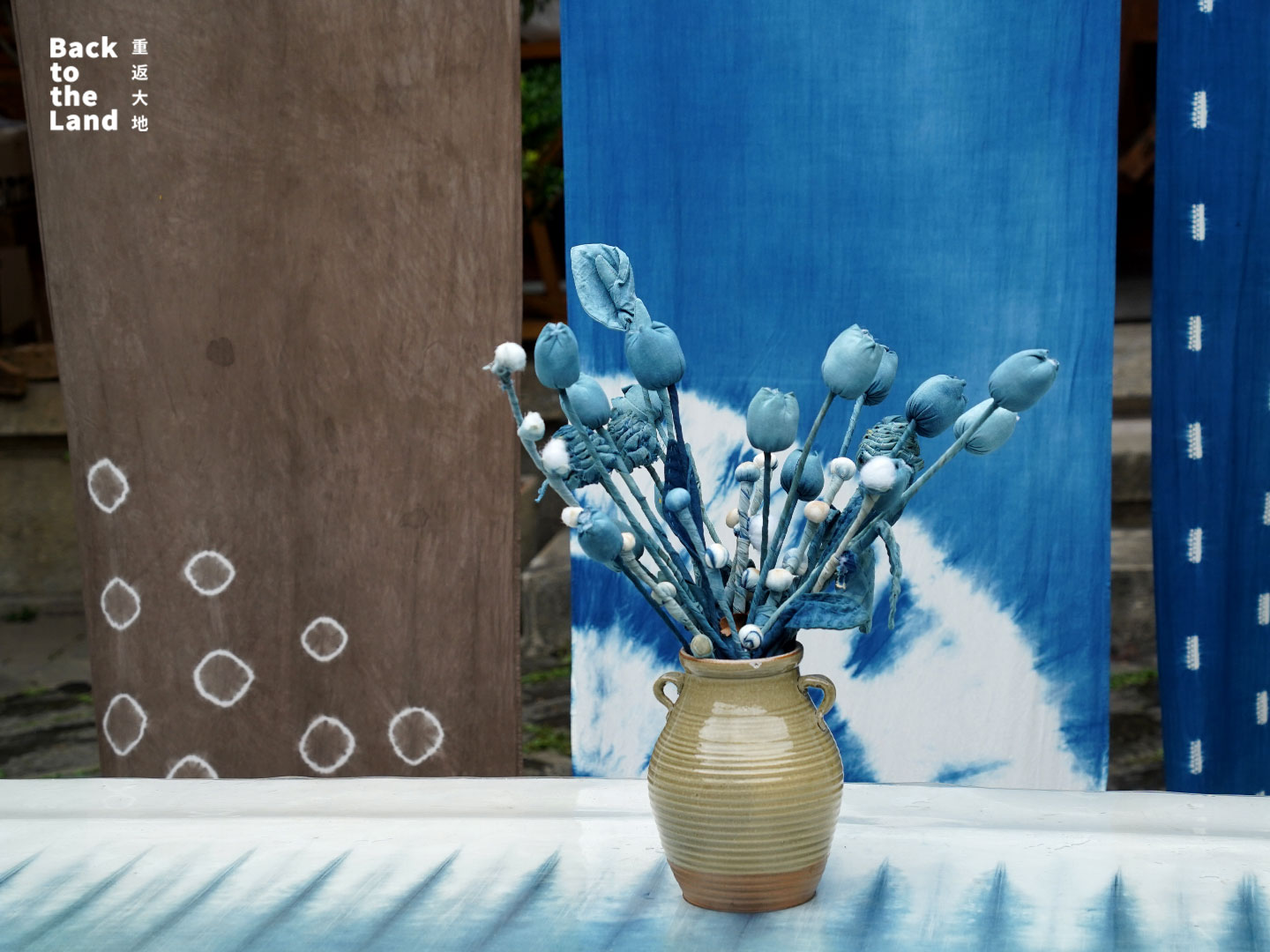 Traditional Dali tie-dye fabrics featuring intricate blue-and-white patterns are reimagined through modern design. /CGTN