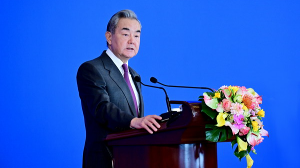 Chinese Foreign Minister Wang Yi, also a member of the Political Bureau of the Communist Party of China Central Committee, addresses a symposium on the international situation and China's foreign relations in 2025 in Beijing, China, December 30, 2025. /Chinese Foreign Ministry