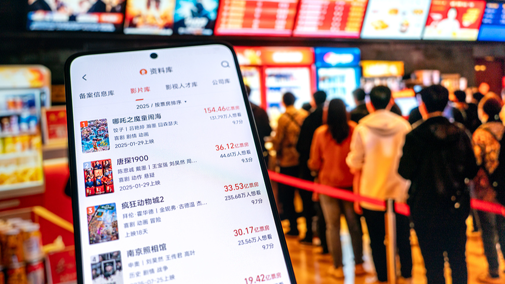 A box office tracking app displays China's 2025 film box office rankings as of December 13, 2025. /VCG