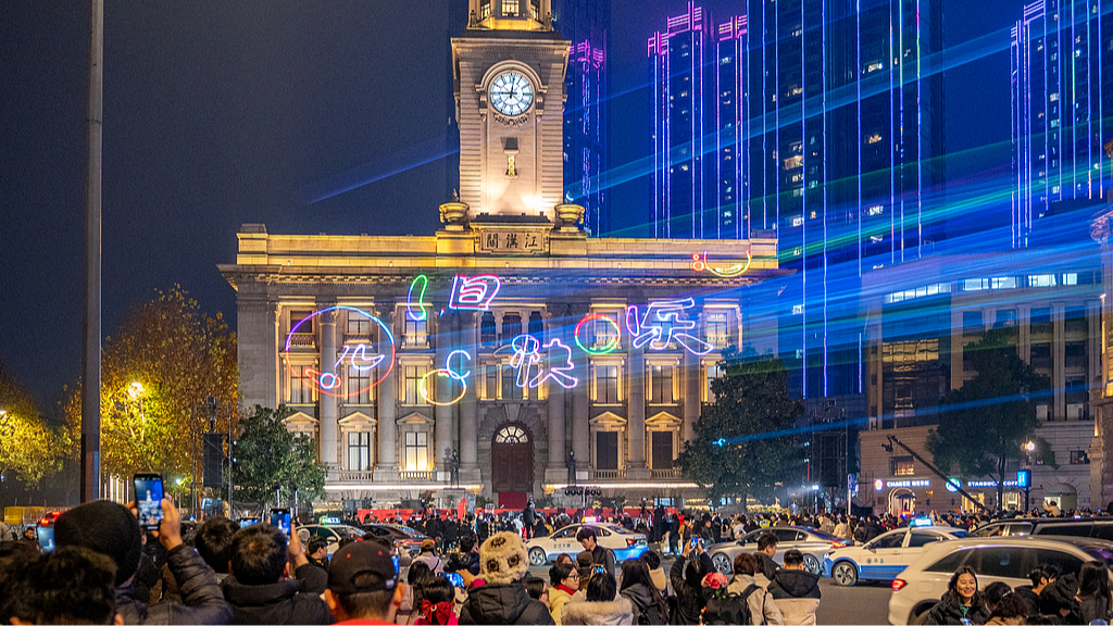 A rehearsal for the New Year's Eve laser light show draws large crowds of visitors in Wuhan, Hubei Province, China, December 30, 2025. /VCG 
