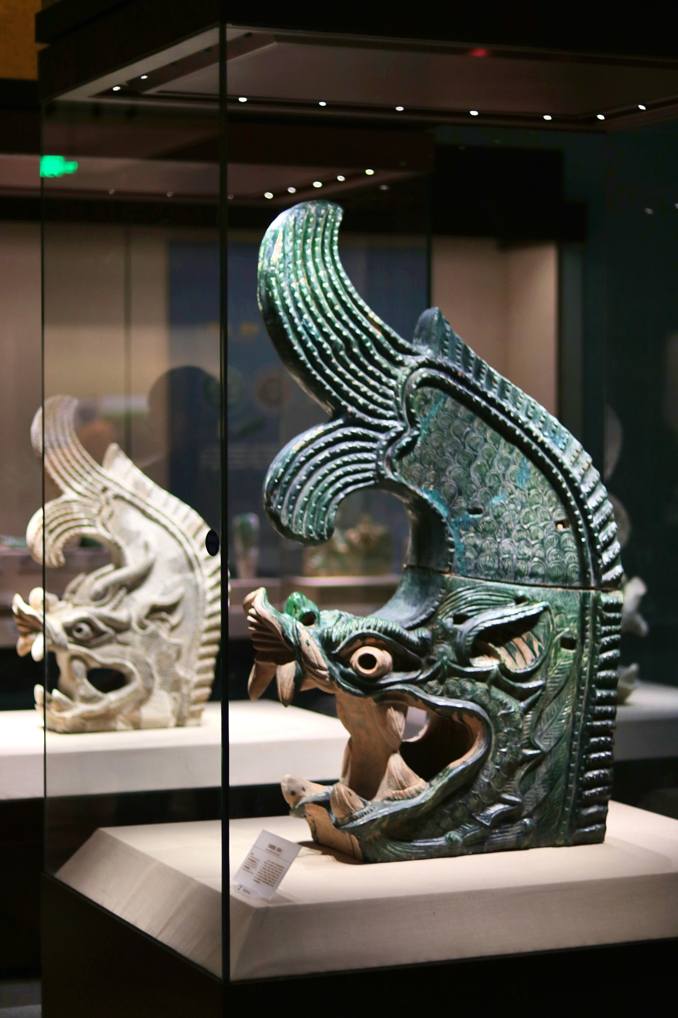 A green glazed architectural ornament from the Xixia Dynasty is displayed at Ningxia Museum. /VCG