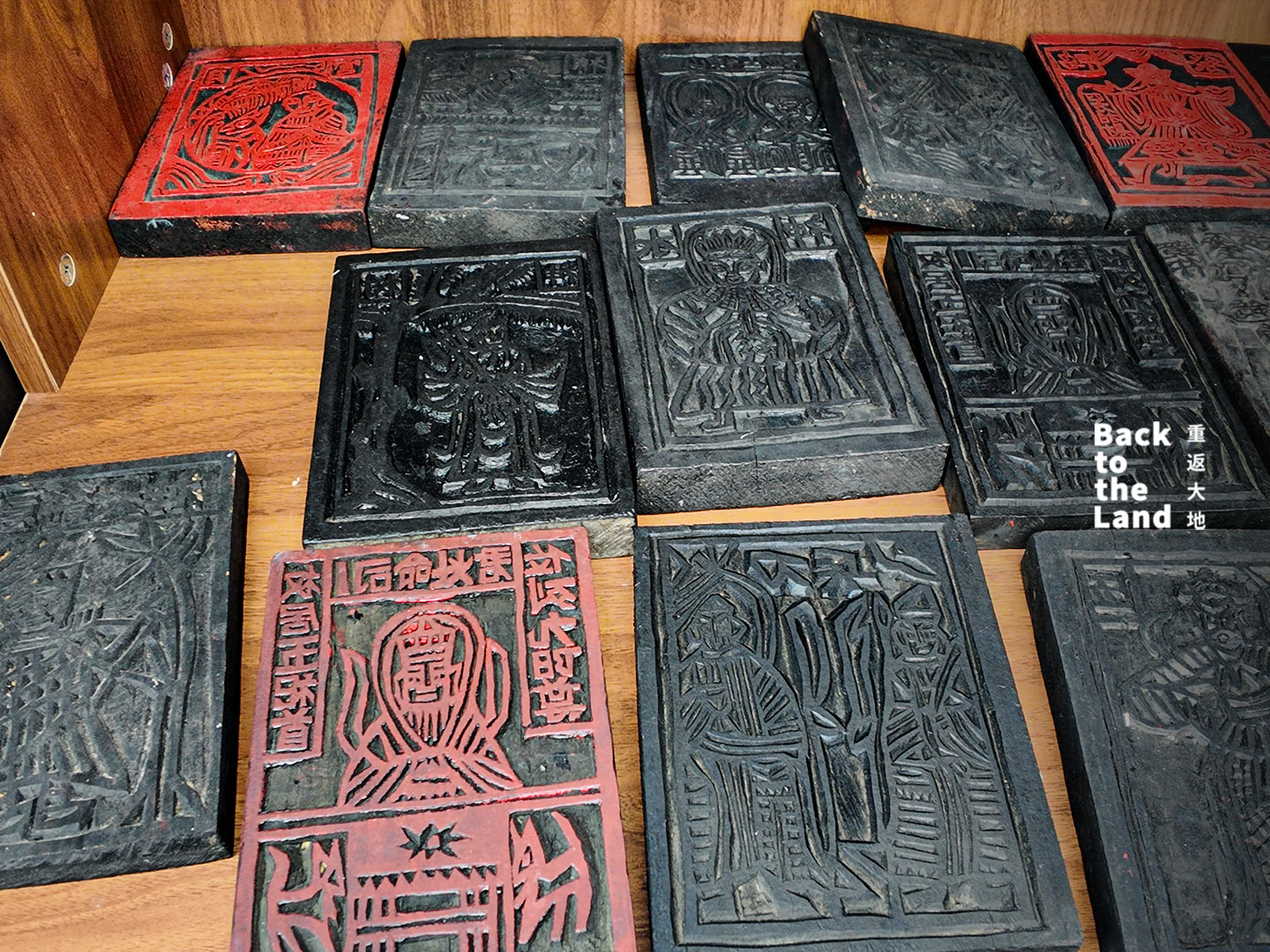 A collection of traditional and modern woodblock prints known as jia ma, showcasing the intricate carving and ink-printing artistry of China's Bai people. /CGTN