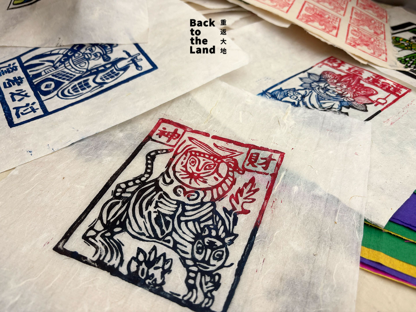 A collection of traditional and modern woodblock prints known as jia ma, showcasing the intricate carving and ink-printing artistry of China's Bai people. /CGTN