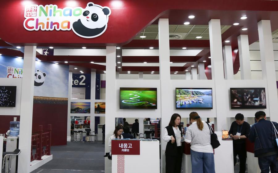 People visit the China exhibition area at the Seoul International Travel Fair in Seoul, South Korea, May 9, 2024. /Xinhua