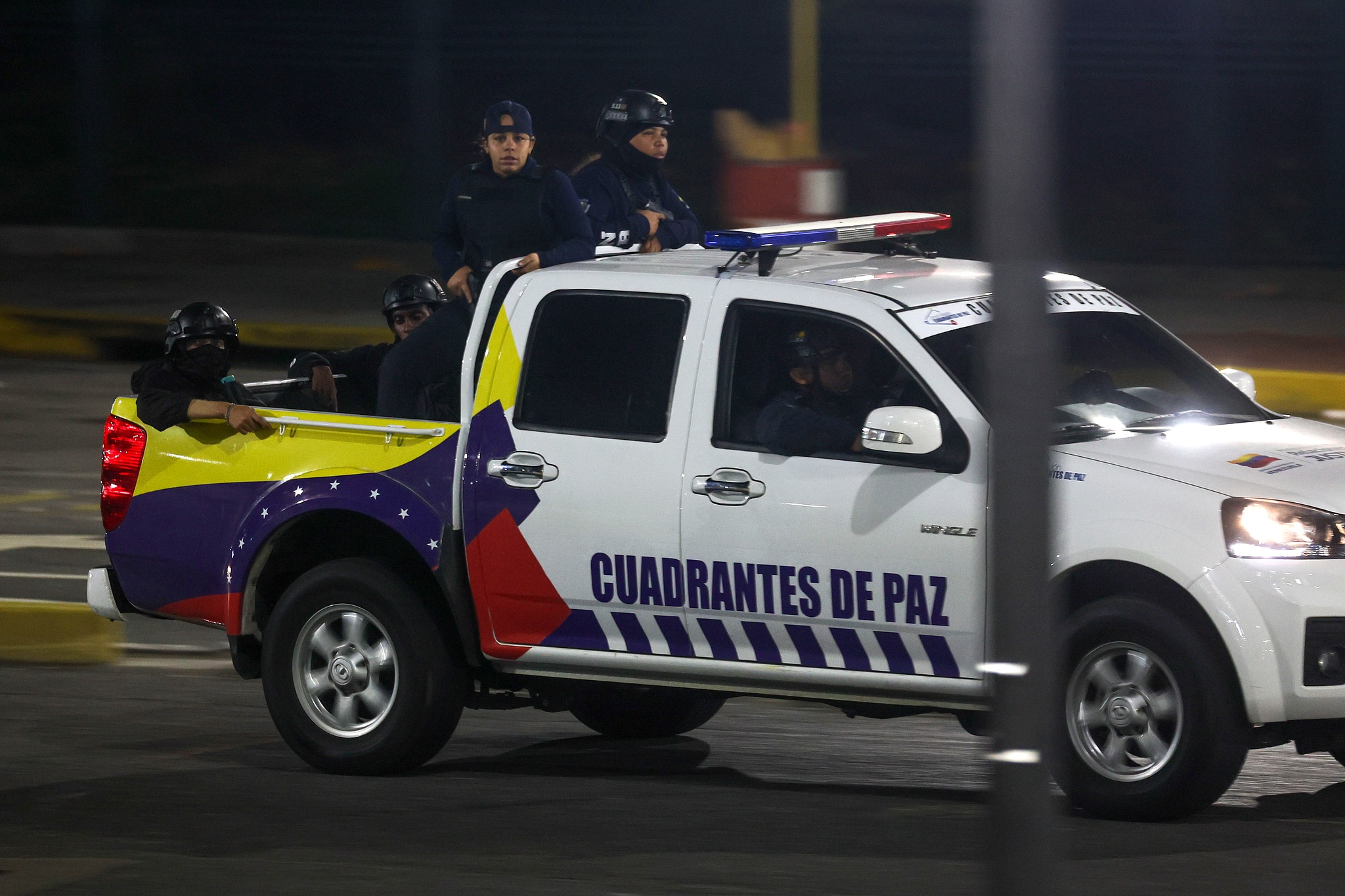 Venezuelan forces on a vehicle patrol the streets, after multiple explosions were reported across the capital, Caracas, Venezuela, January 3, 2026. /VCG