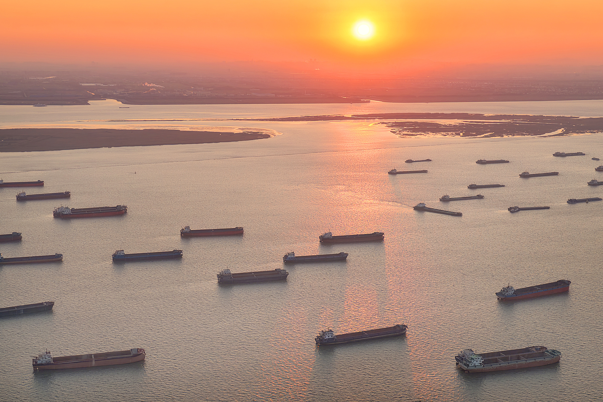 Cargo ships ply the Yangtze River in Nantong, Jiangsu Province, east China, January 2, 2026. /VCG