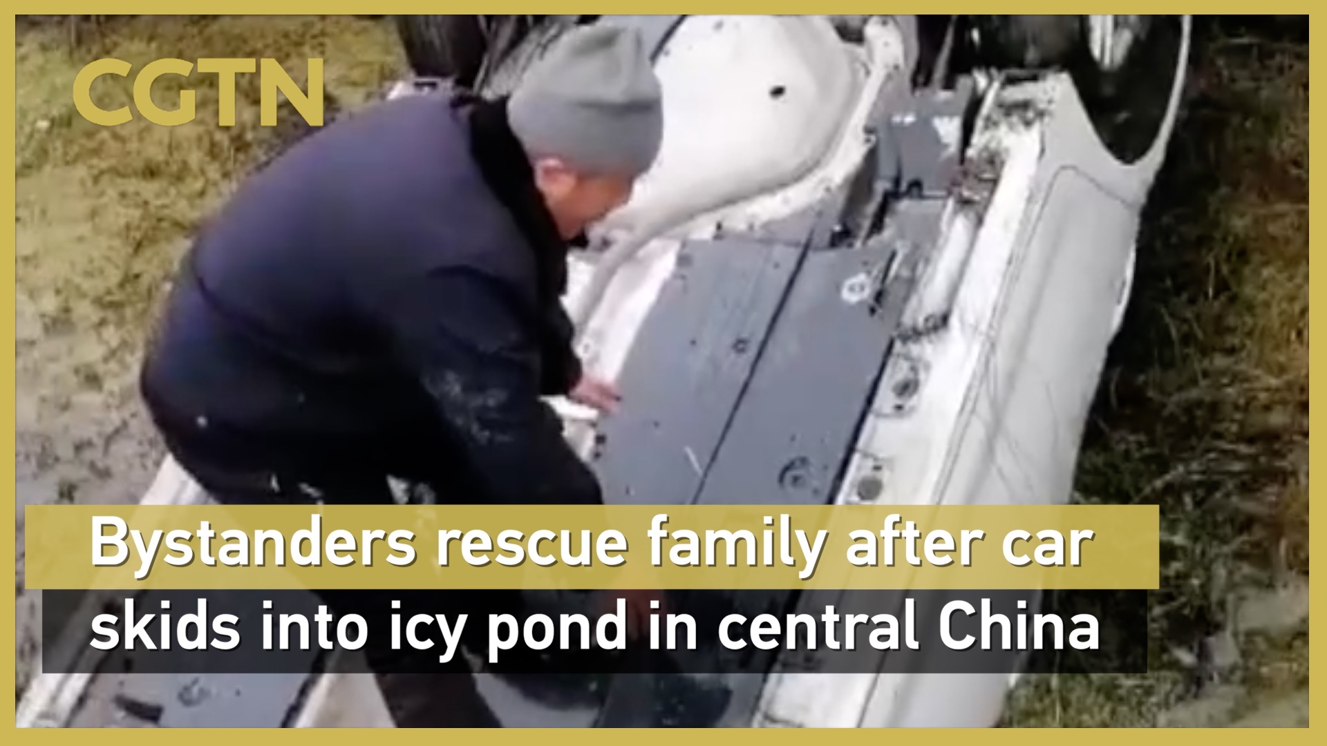 Bystanders rescue family after car skids into icy pond