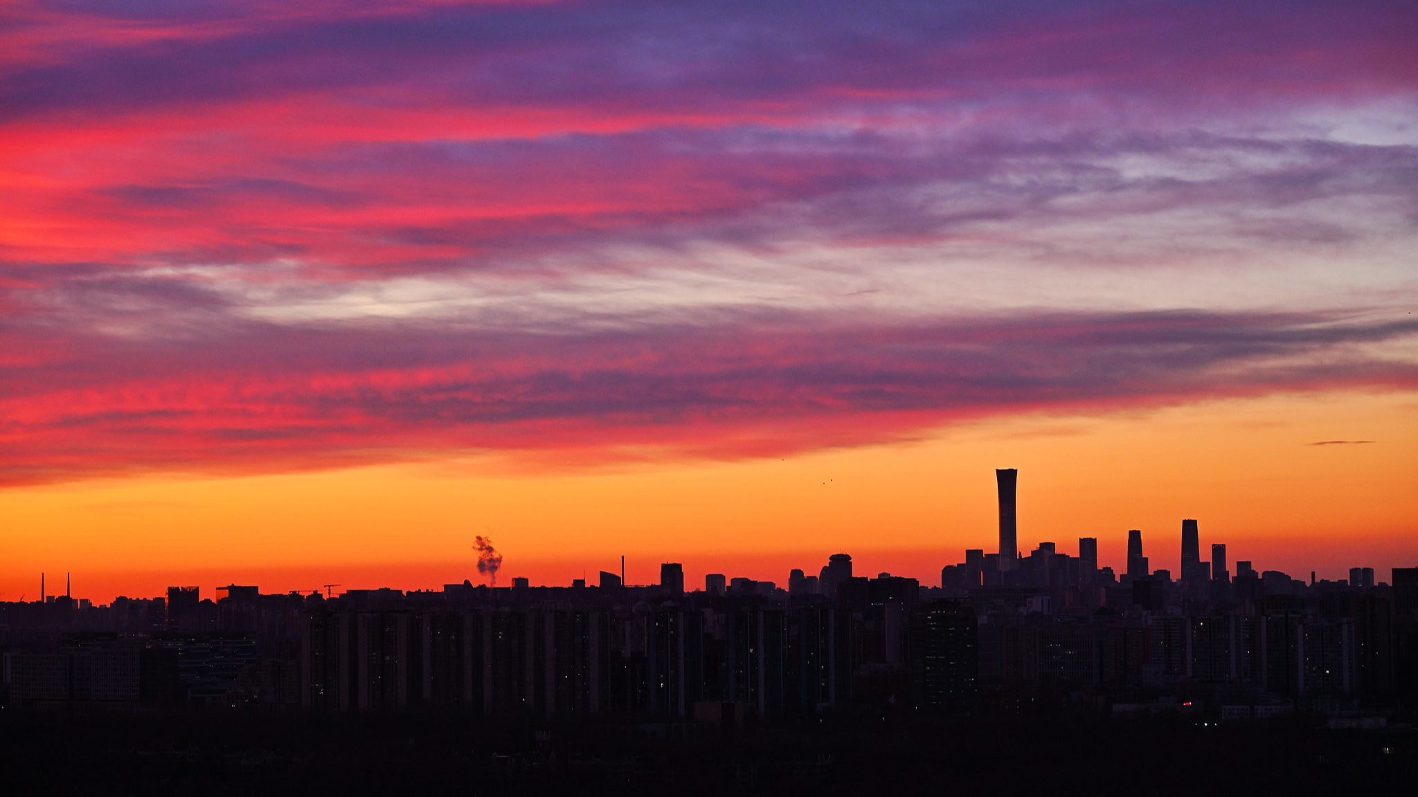 Splendid morning glow illuminates Beijing skyline