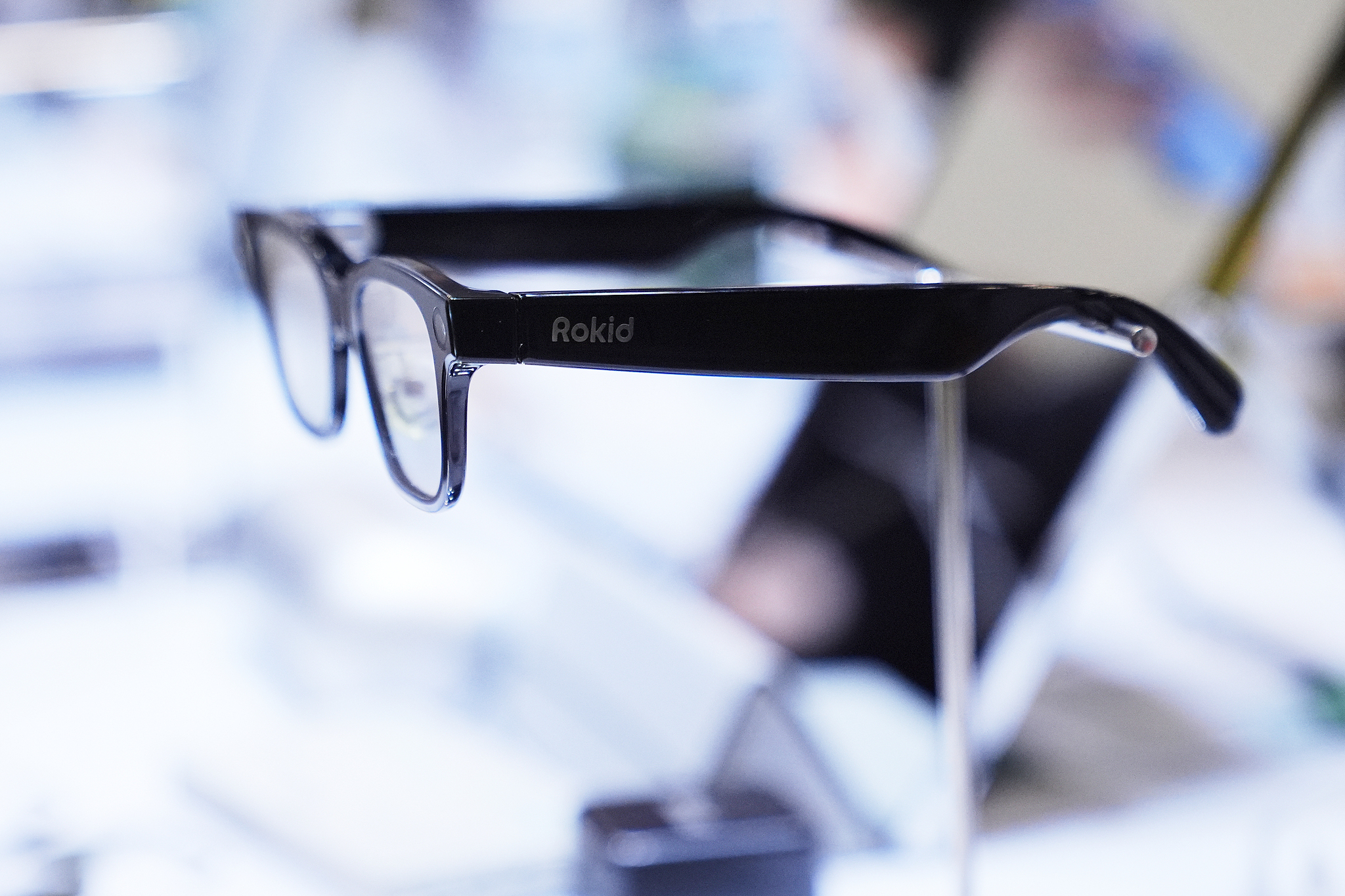 Rokid AR glasses sit on display during the CES tech show. /VCG