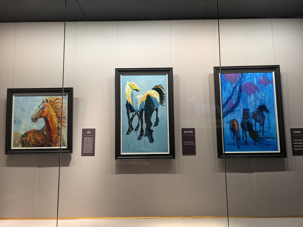 Horse-themed paintings are displayed at the Shenyang Museum in Shenyang, Liaoning Province, China, on January 6, 2025. /IC