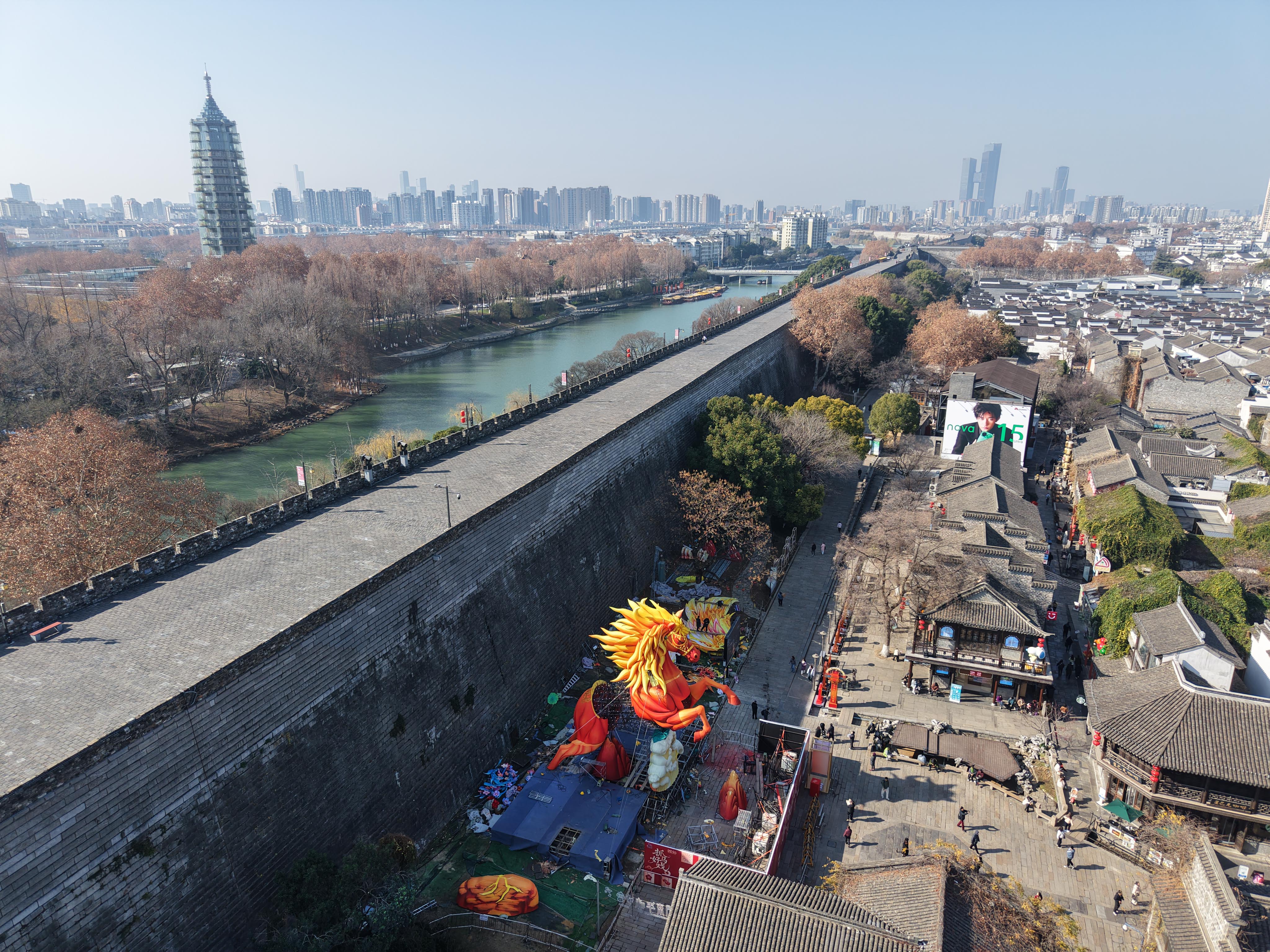 An aerial view of a giant leaping horse-shaped lantern installation is under construction at the Laomendong scenic zone in Nanjing, Jiangsu Province, on January 7, 2026. /IC