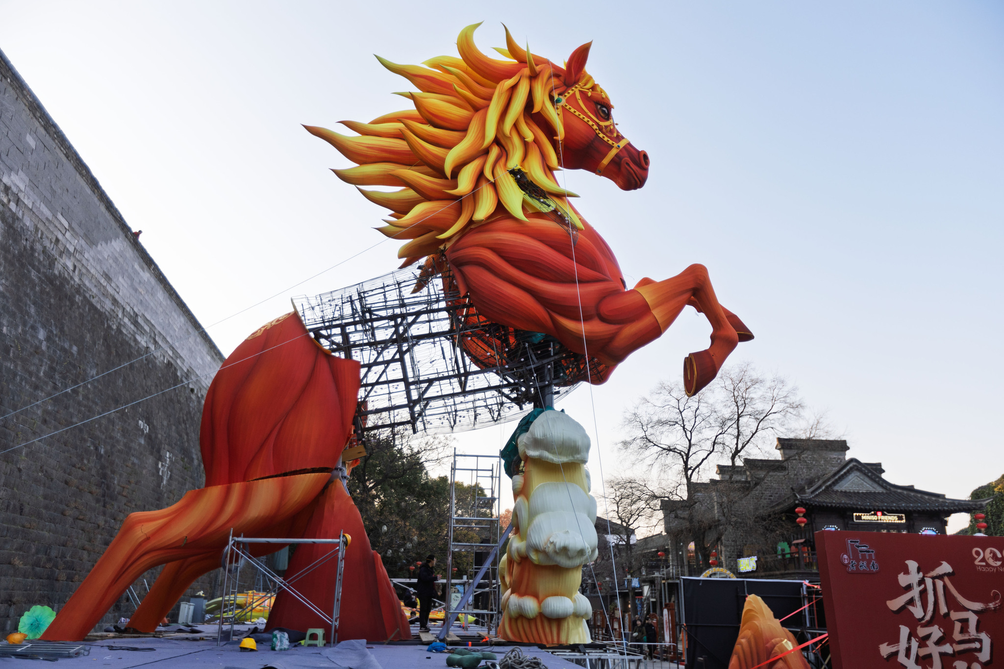 A giant leaping horse-shaped lantern installation is under construction at the Laomendong scenic zone in Nanjing, Jiangsu Province, on January 6, 2026. /VCG