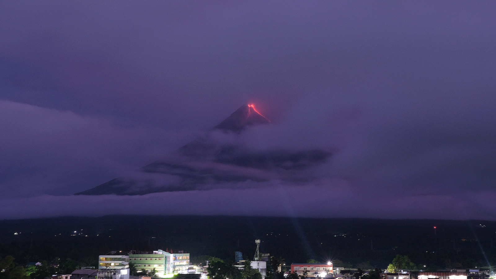 Nearly 1,000 families evacuated as Mayon volcano oozes lava
