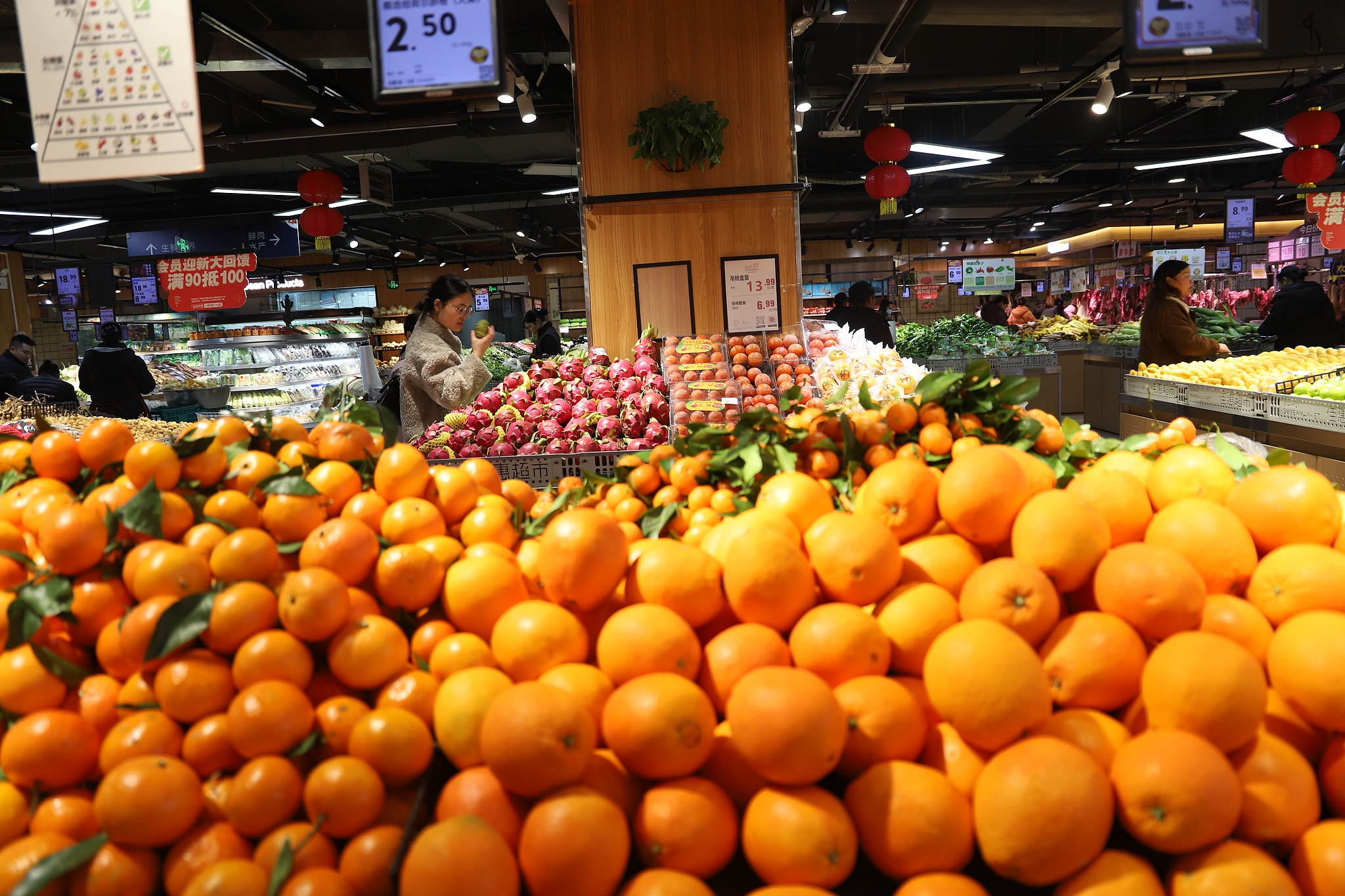 Customers are shopping for goods at a supermarket in Huaihua, Hunan Province, China, Jan 9, 2026. /VCG