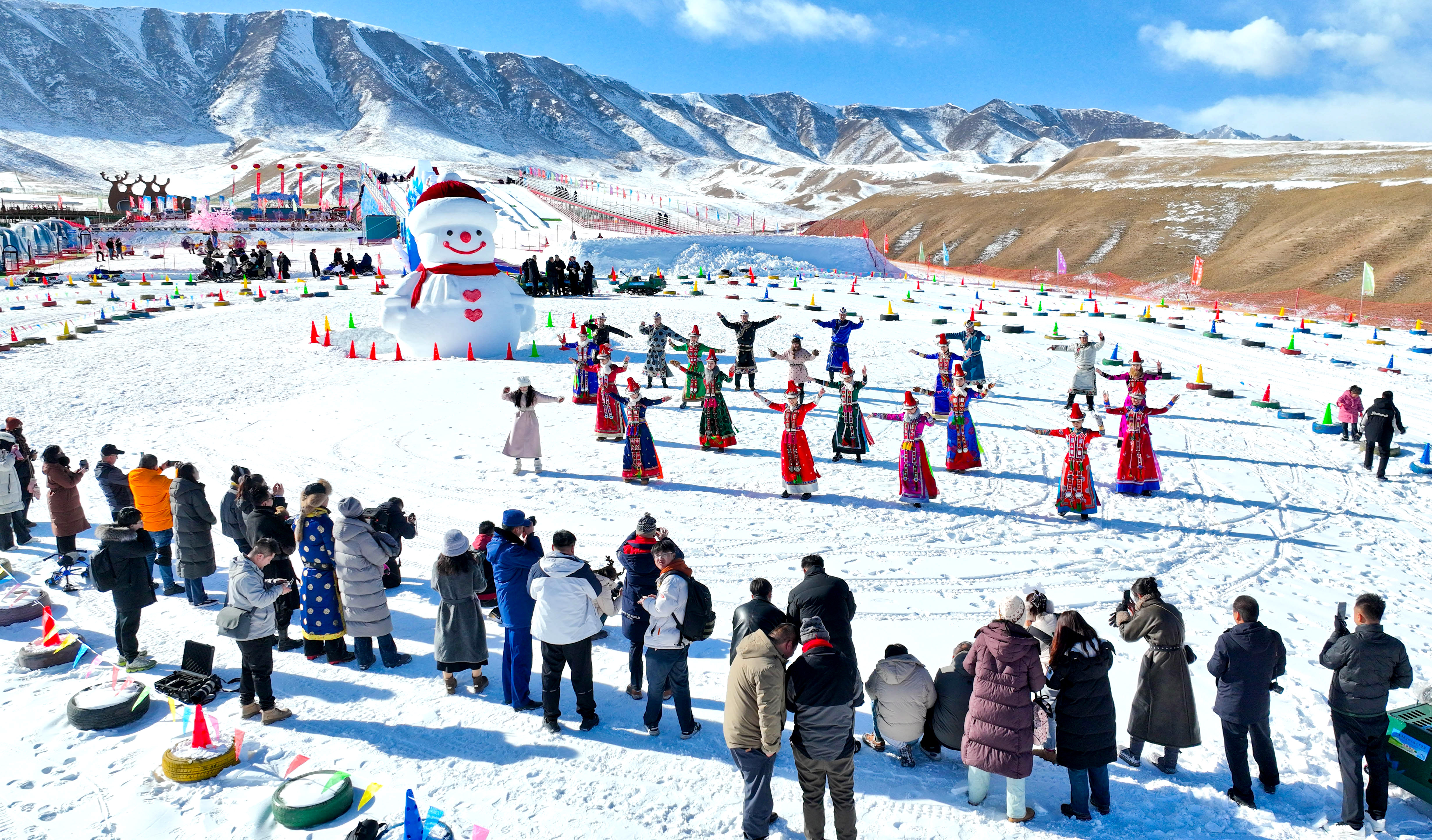 Visitors enjoy performances at Shenlu Park, at the foot of the Qilian Mountains in Zhangye, Gansu Province on January 9, 2026. /IC